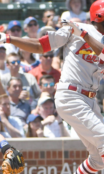 Fowler homers but Cardinals drop series opener to Cubs
